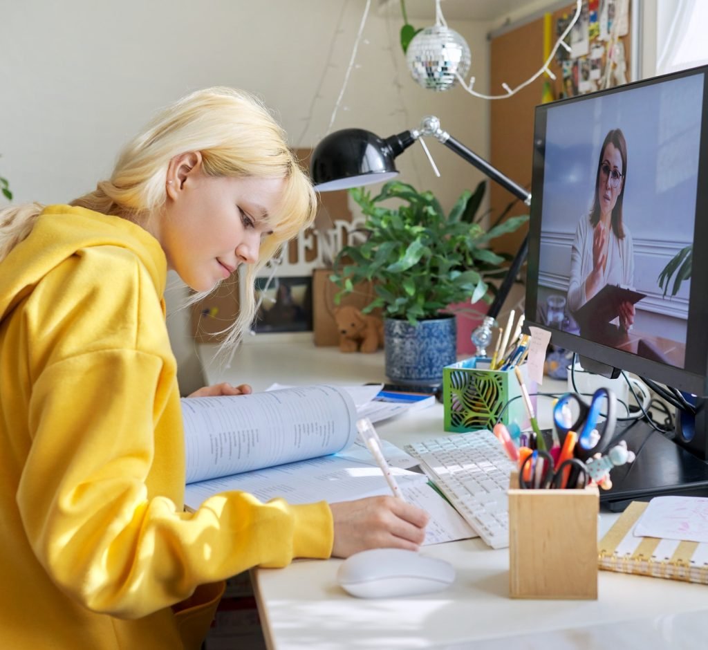 teenage-student-having-an-online-lesson-on-the-computer-at-home.jpg